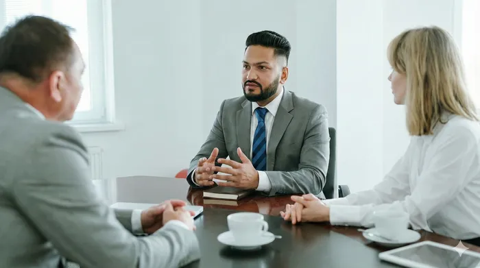 Varun Bhatti consulting with a client at Finance World